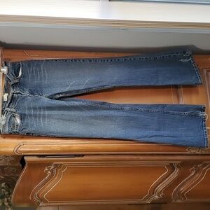 EXPRESS, women's blue jeans. Boot cut. Size 11/12 R. Medium disstressed.